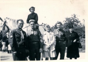 Marie Therese Closset (on horse) with her sister, her aunt, and three other soldiers from the 507th Engineer Company